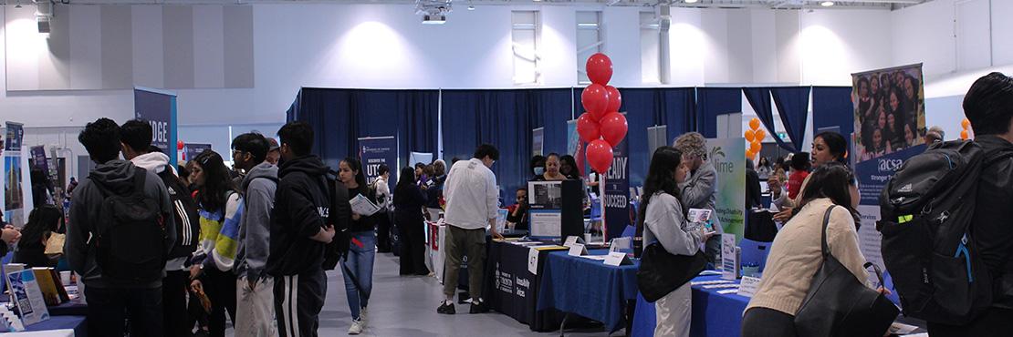 students and vendors at the get experience fair