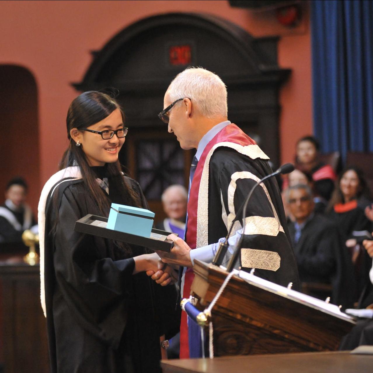 Grad wins three major academic honours