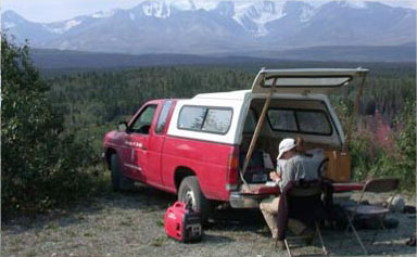  picture of a researcher working outdoors 