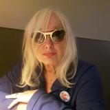 Headshot of Tanya Mars wearing a silver framed sunglasses