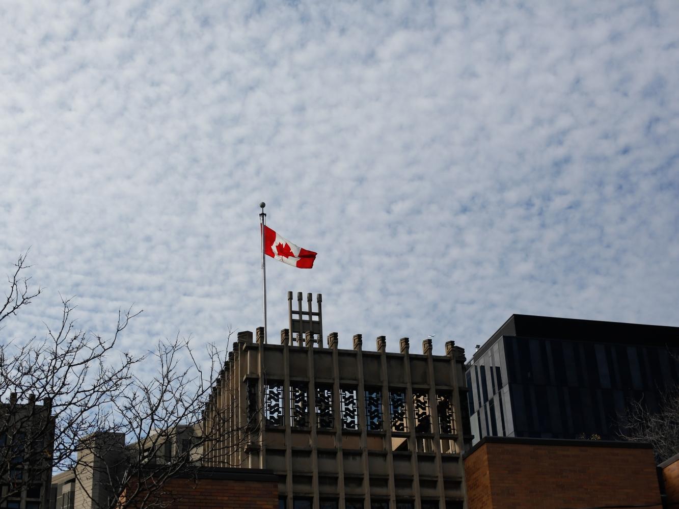 canadian flag atop massey college