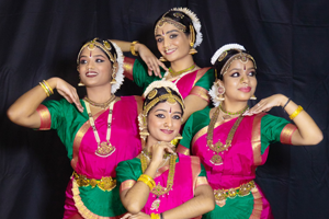 Niro Dance Academy dancers pose, wearing Tamil costumes