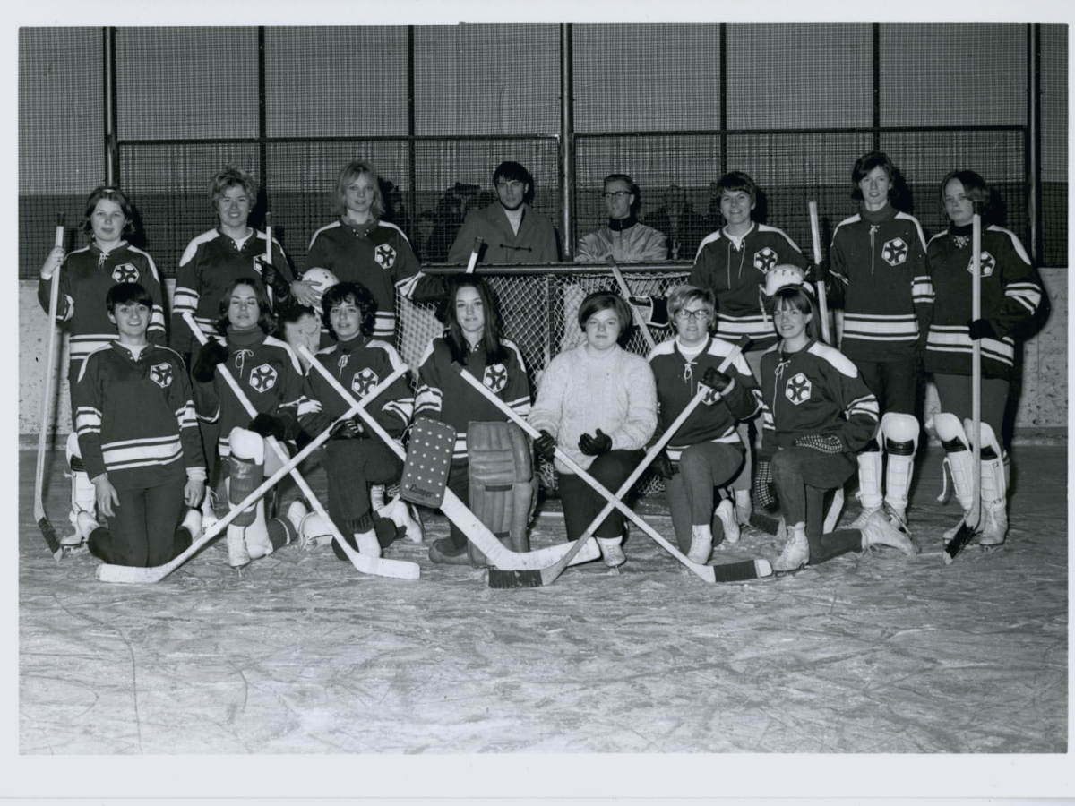 black and white photo of a women's hockey team