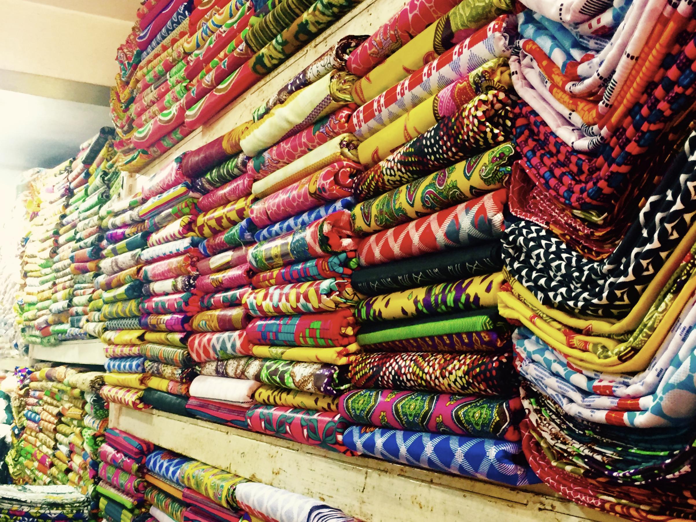 Colourful fabrics for sale in a store in Dakar, Senegal
