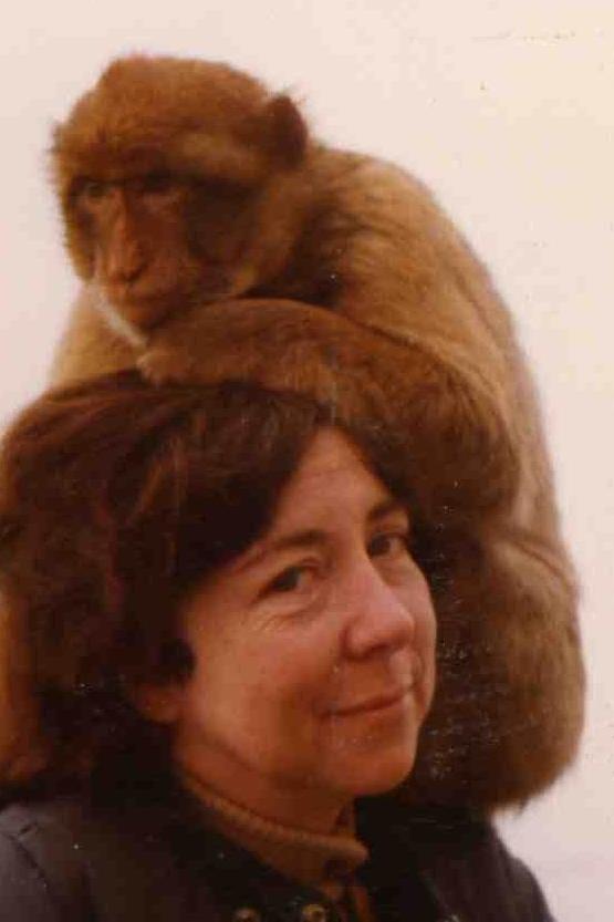 Frances Burton with a monkey on her head
