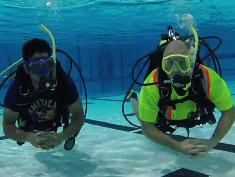 scuba instructor with student
