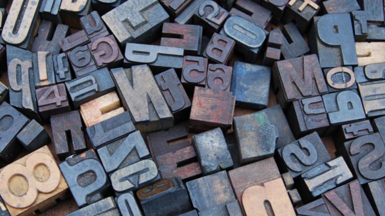 Fun image of hundreds of wooden alphabet letter blocks