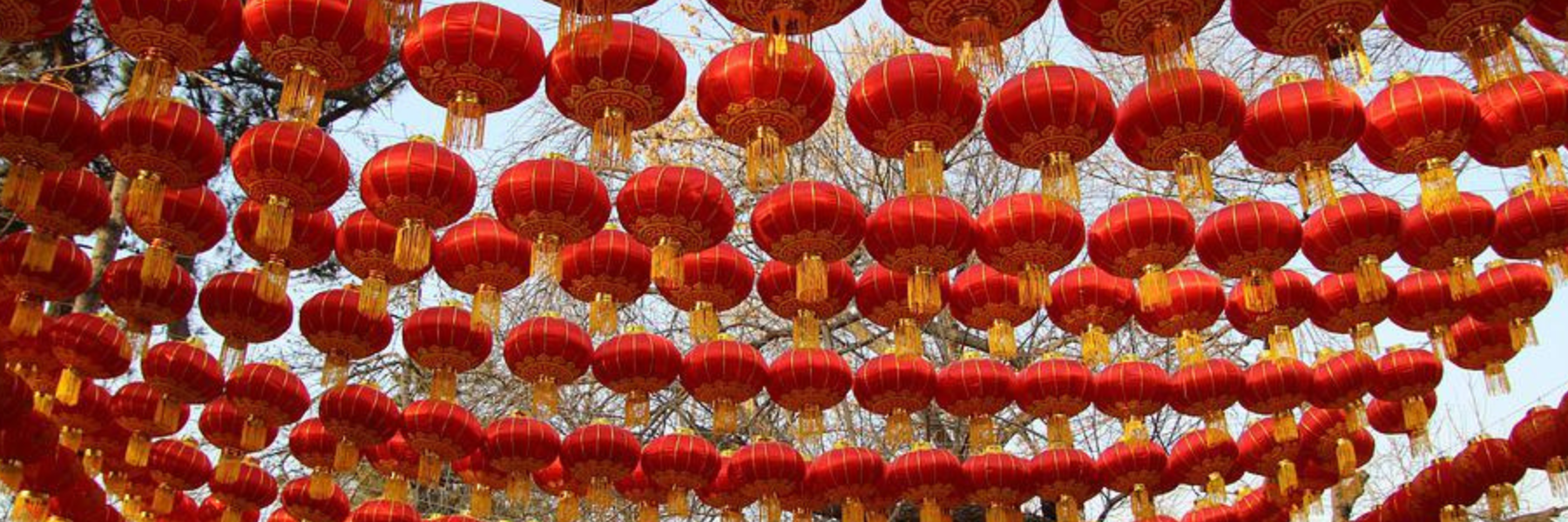 Strings of hanging red and gold lanterns