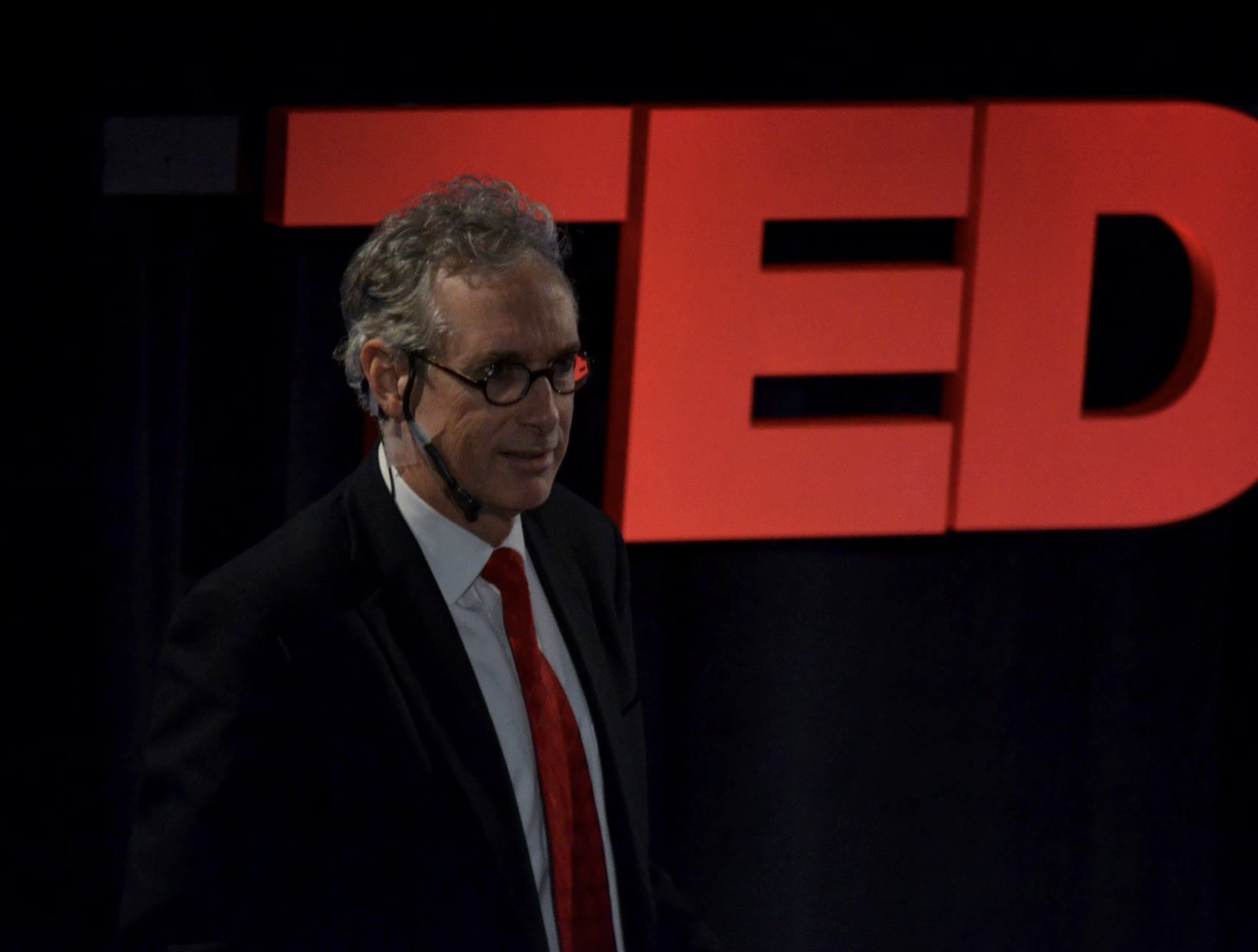 professor leonard at a TED talk