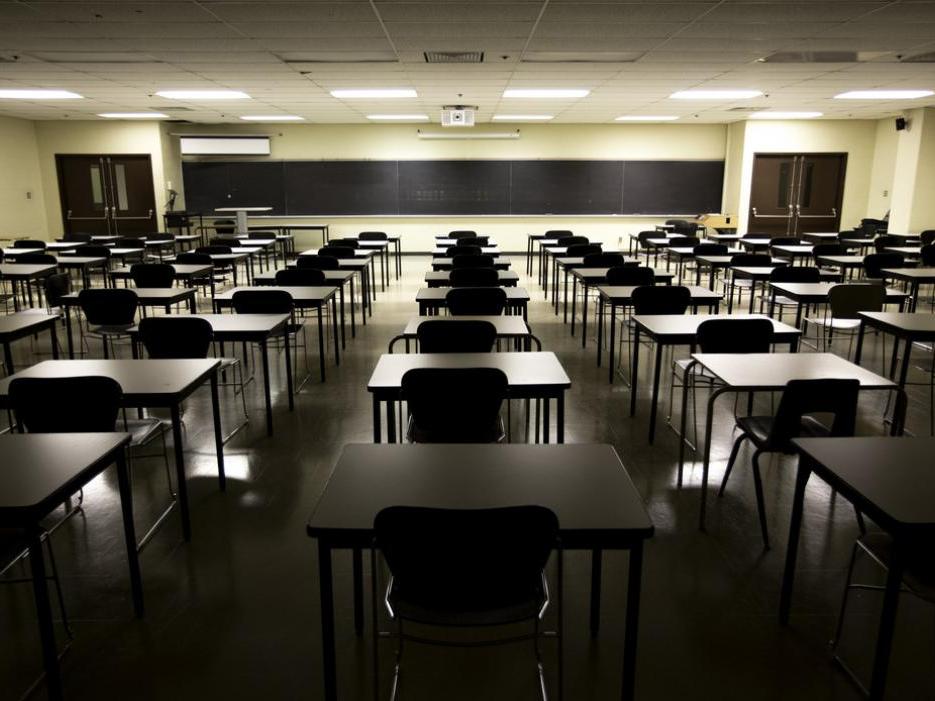 Empty classroom with dramatic lighting