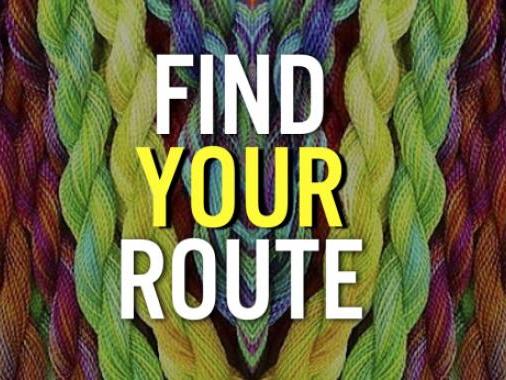 Colored twists of embroidery thread behind "Find Your Route"