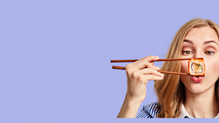 woman eating sushi on purple background