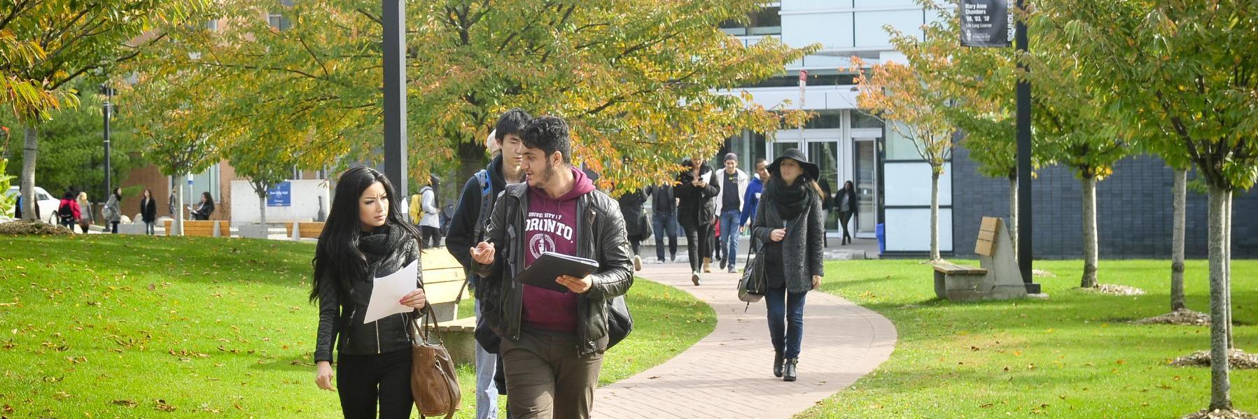 students walking on a path at UTSC