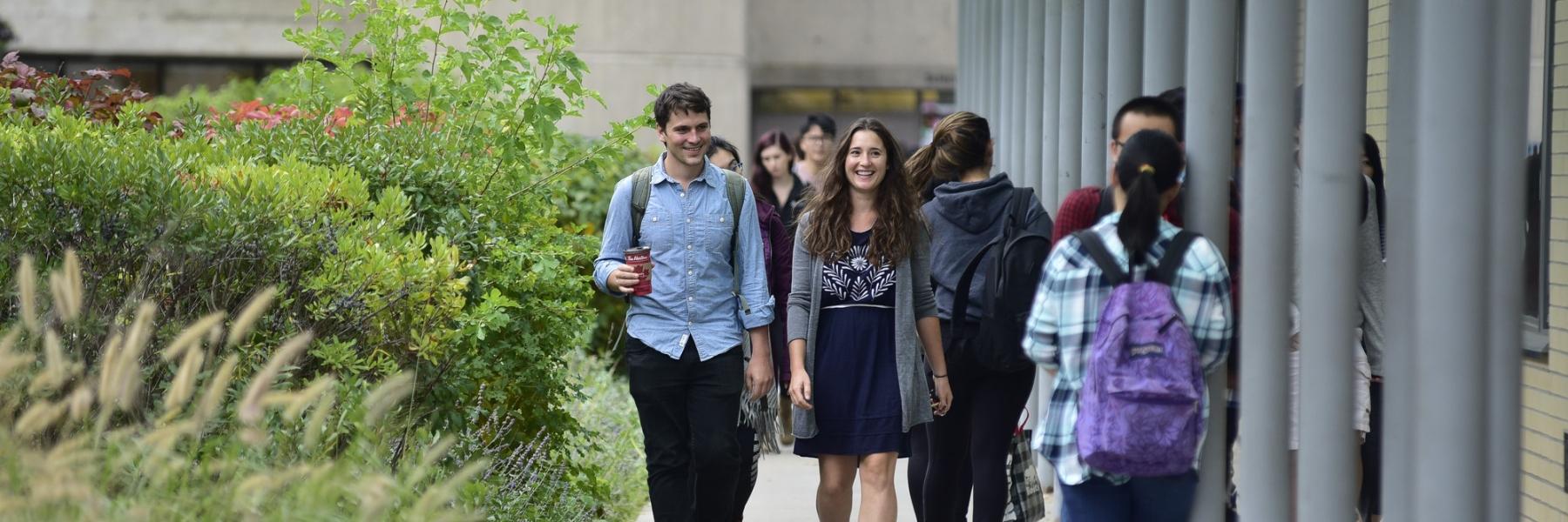 students walking otuside on campus