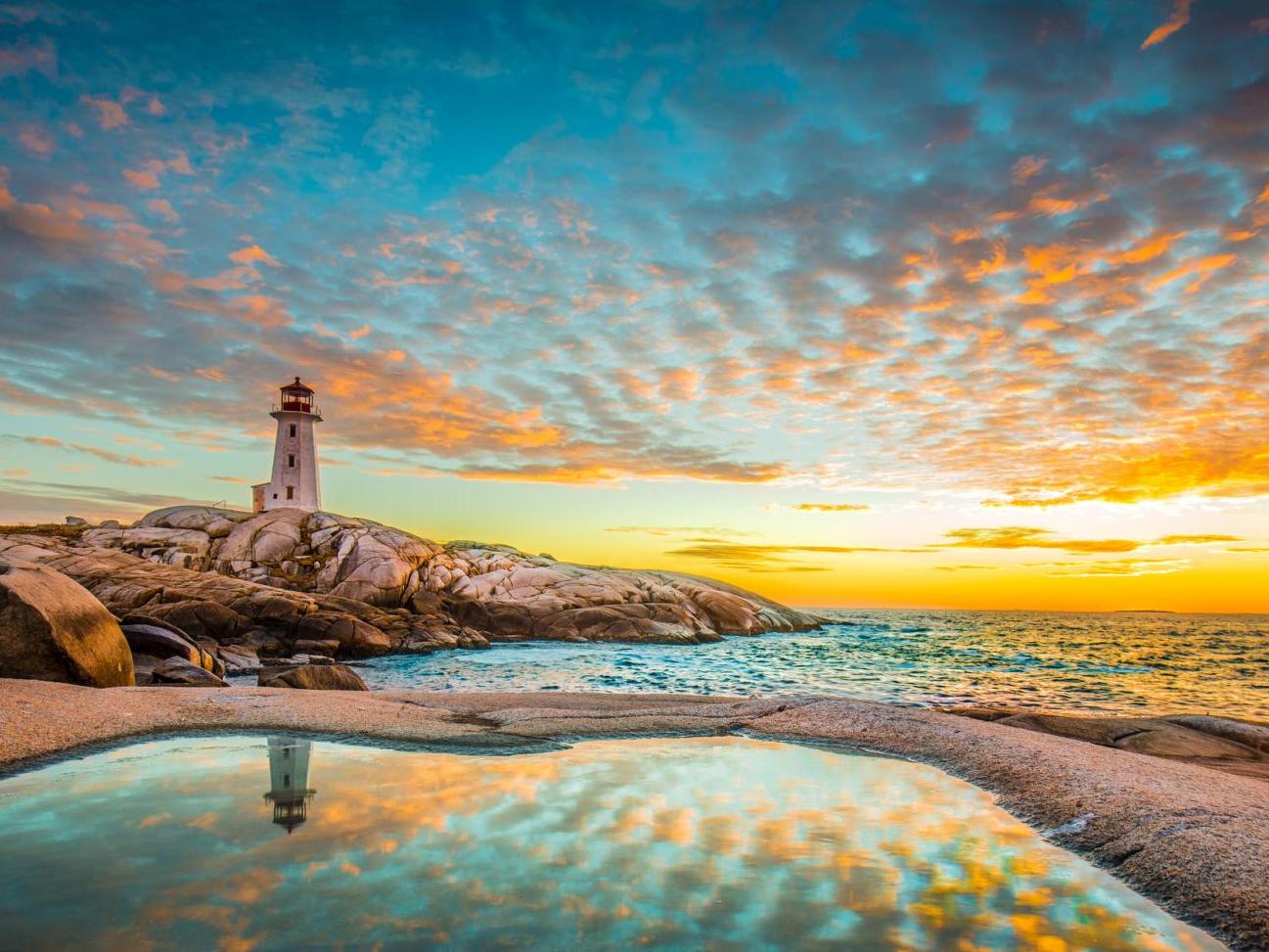 Peggy's Cove lighthouse at sunset