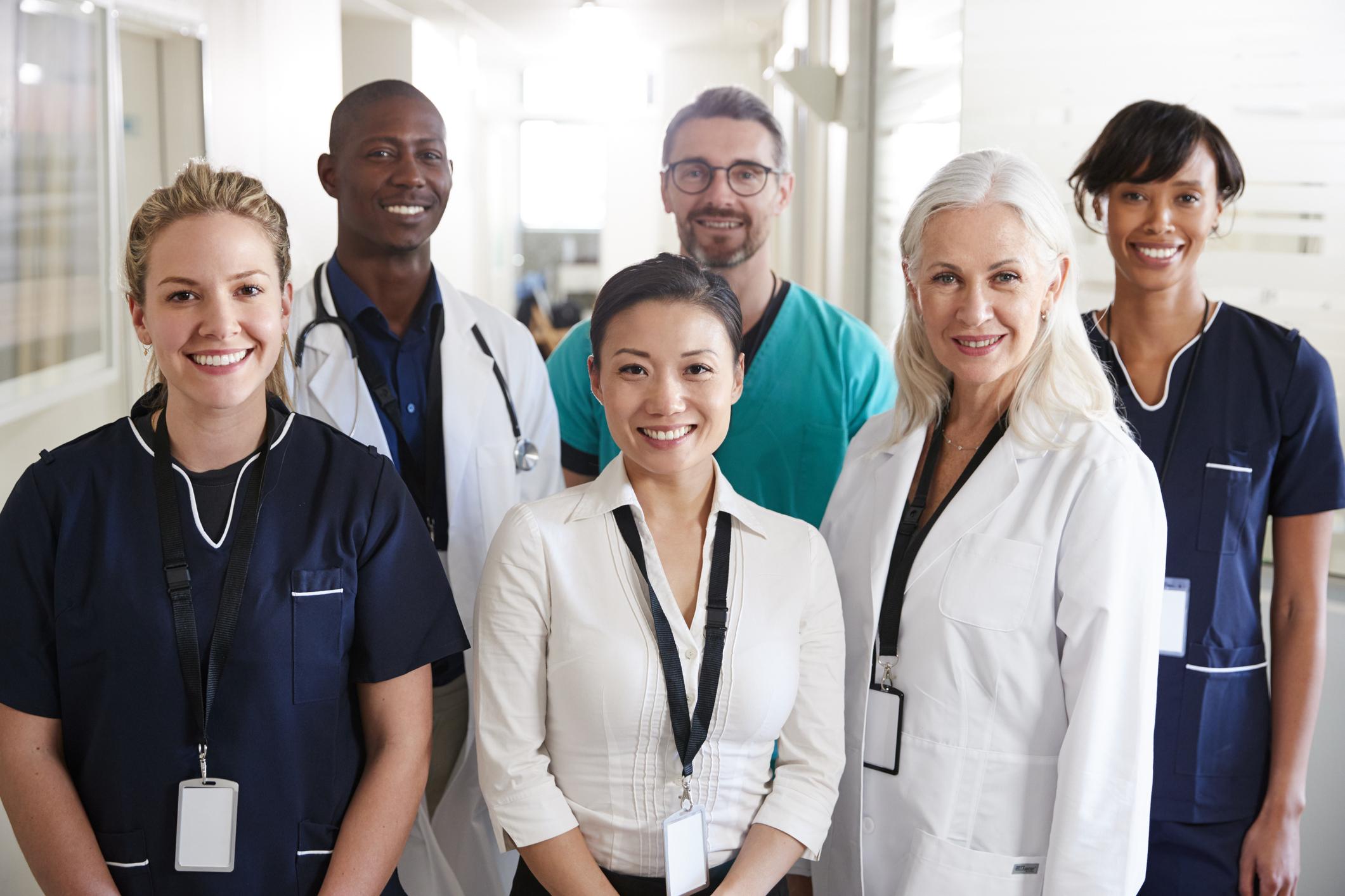 Portrait of a medical team in a hospital including doctors, nurses and allied health professionals.