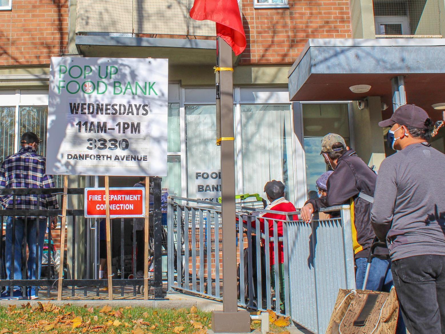 People line up for a food bank on Danforth Avenue at the height of the pandemic in 2020
