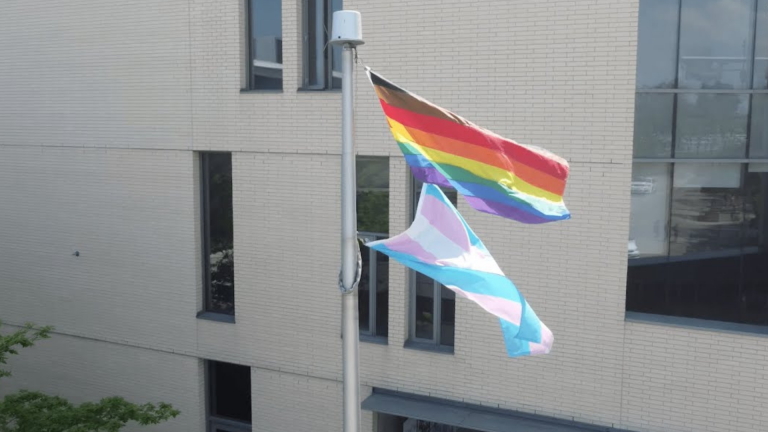 Pride flags blowing in the wind at UTSC.