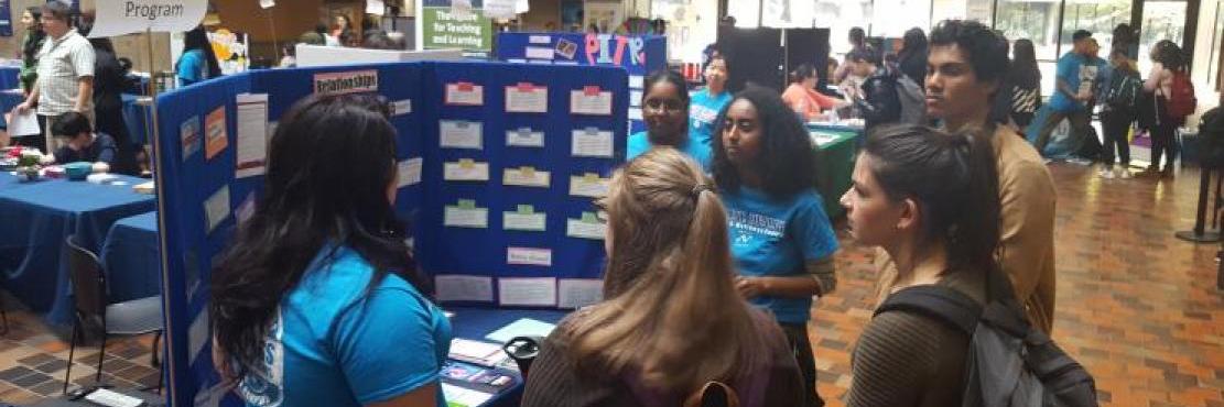 sexual health peer educators at display with students