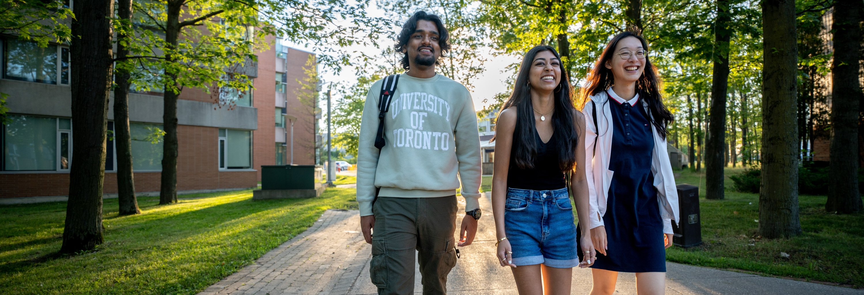 Three students walking on the U of T Scarborough campus