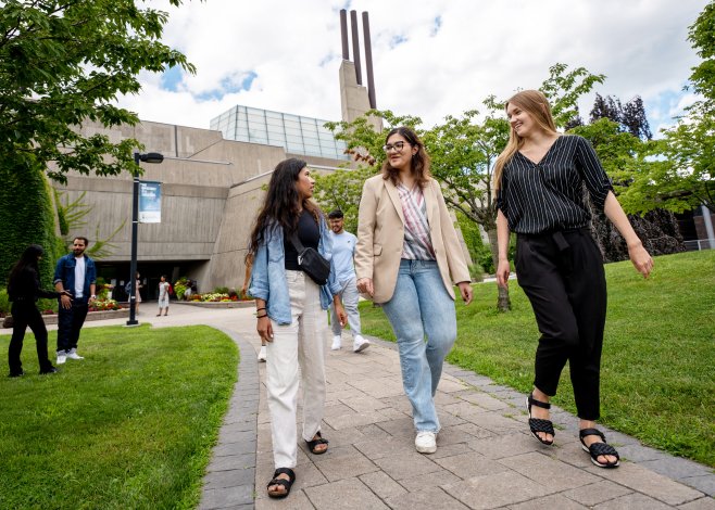 Three students walking on the U of T Scarborough campus