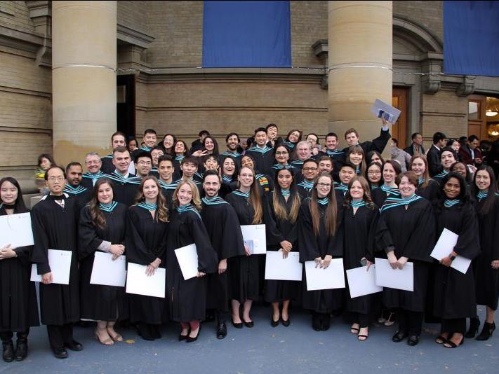 Group of graduating students in convocation robes