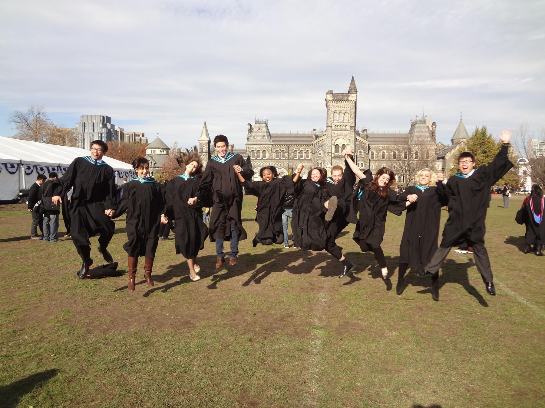 Graduated students jumping