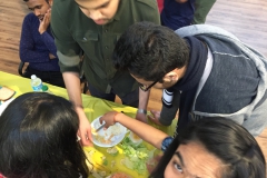 Teams working together to create a delicious wrap