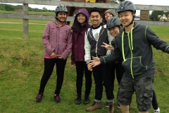 Students with helmets who are ready to ride the horses