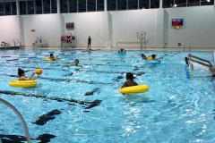 Students playing a game of water polo