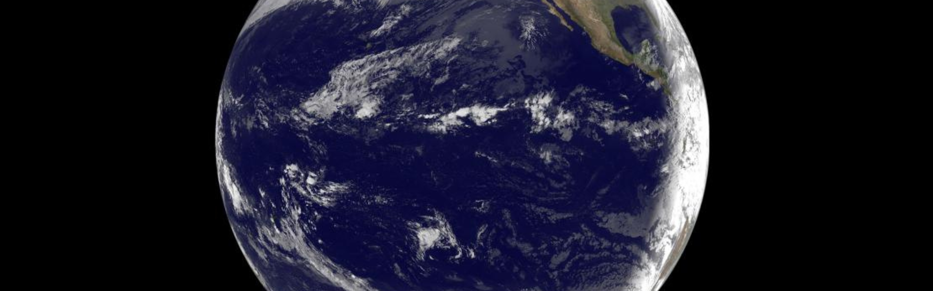 Photo of the Earth by NOAA/NASA GOES Project