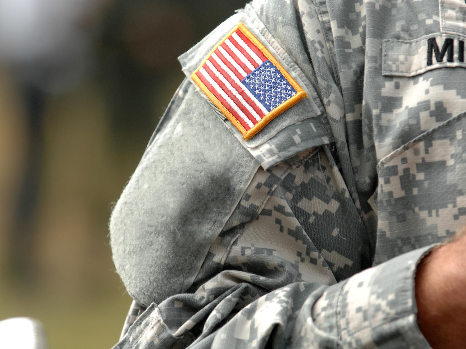 The sleeve of a US soldier with flag patch