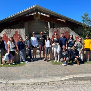 The group in front of the Ojibwe cultural centre in M’Chigeeng First Nation
