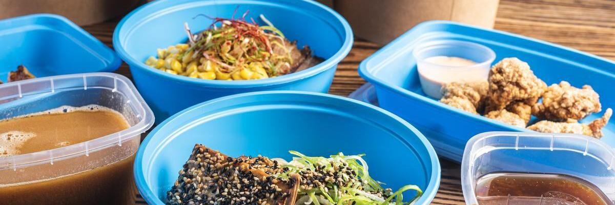 blue take out containers with food