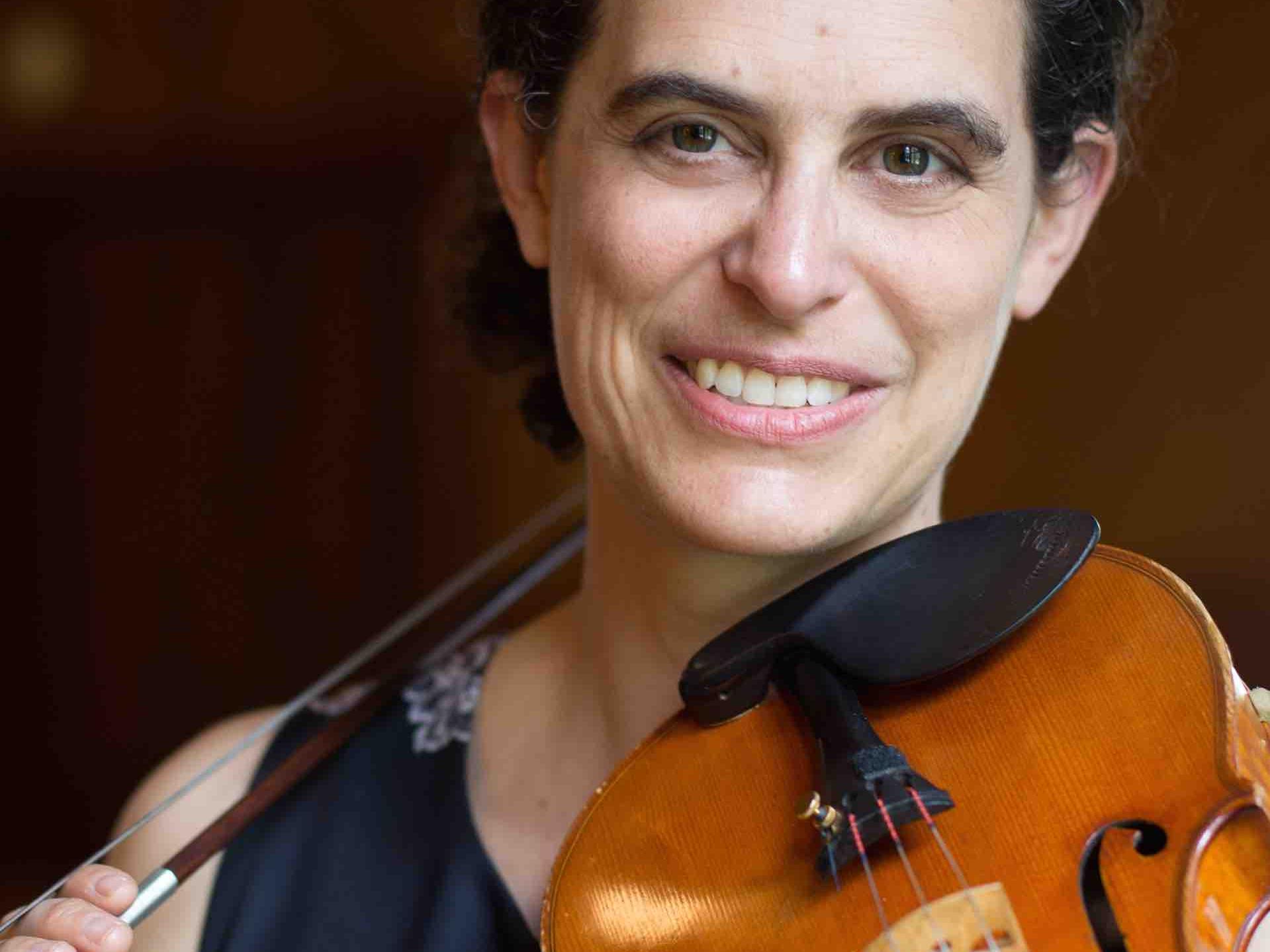Professor Laura Risk playing violin